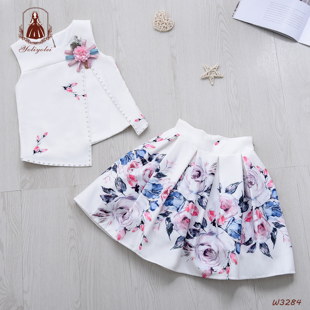 W3284 Wholesale Solid Flower Casual Children Cloth Sleeveless Irregular Top White Pink Fashion Pattern Girl Clothing Set For Kids