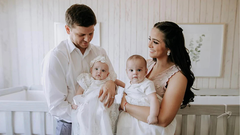 Catholic baptism and christening ceremony with family and babies