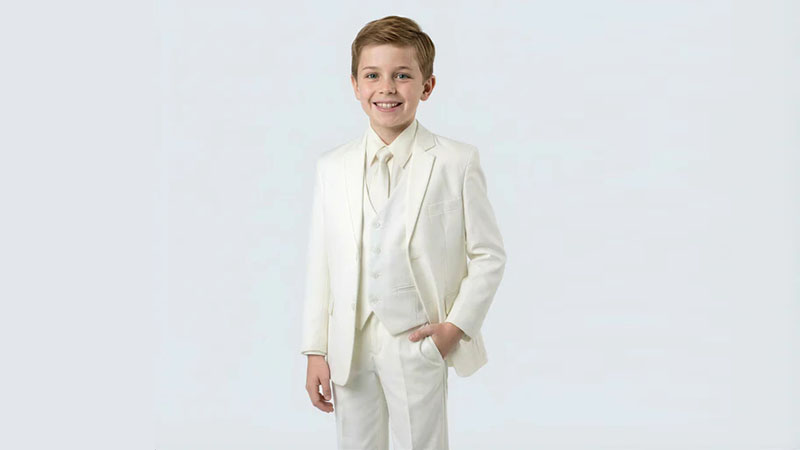 Boy wearing white First Communion suit